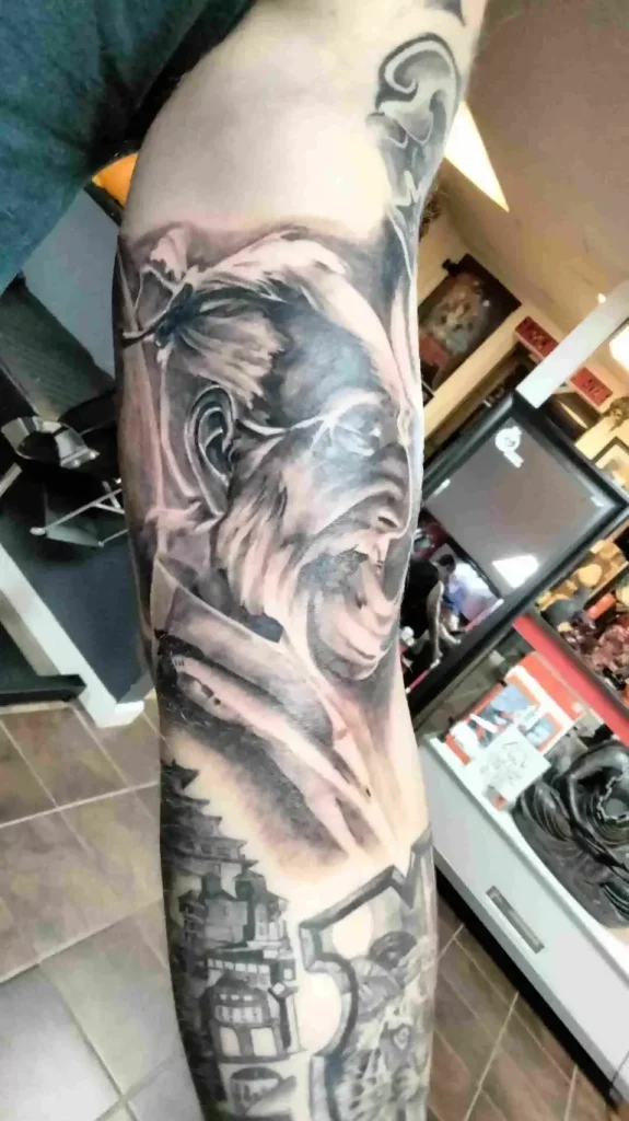 Custom black and grey realism tattoo done at Tainted Flesh Body Art North in Wilmington DE